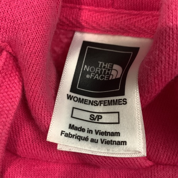 This is a size small The North Face pink hoodie. - Picture 2 of 3